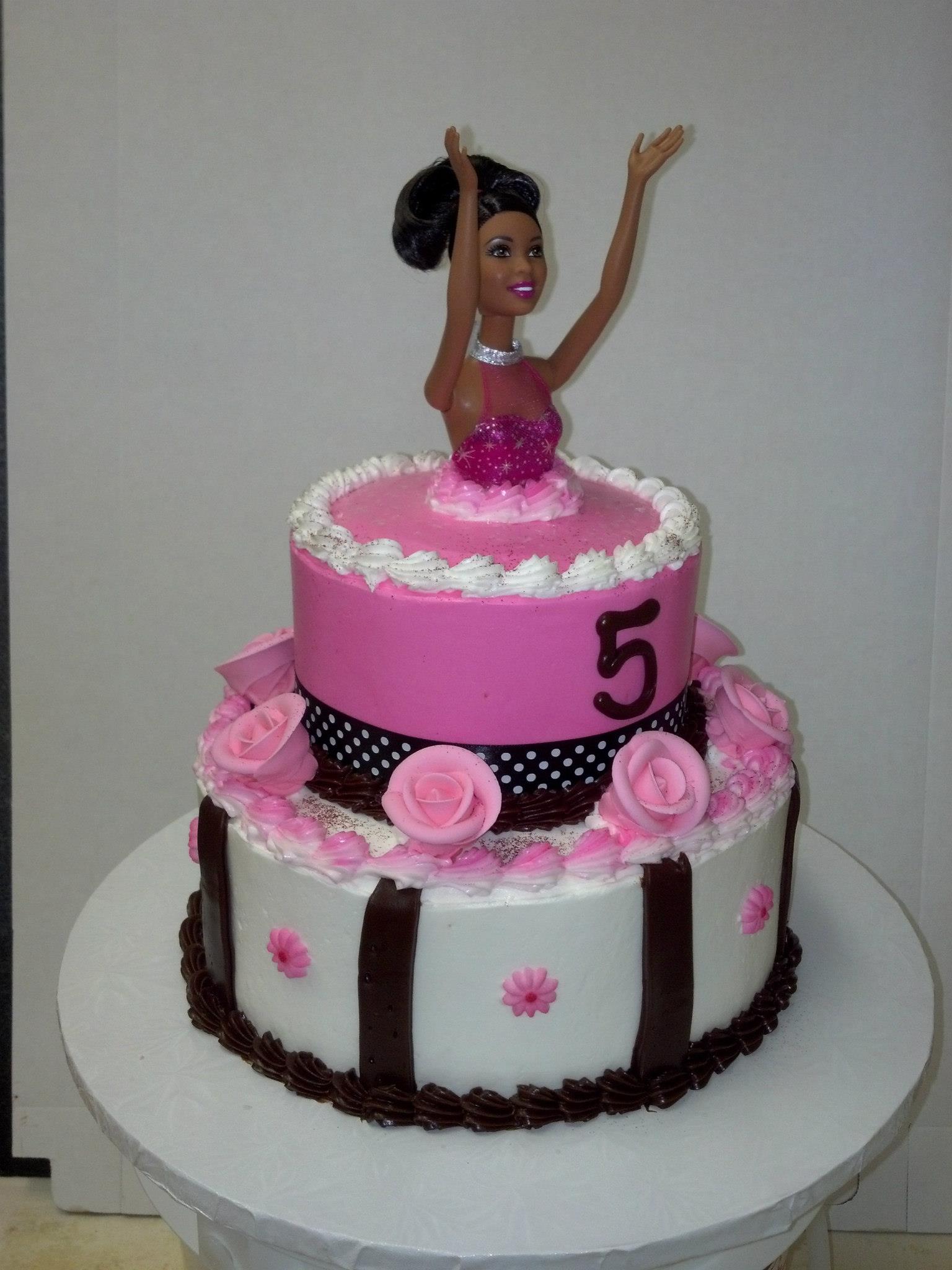 Doll 2 tier cake in pink and chocolate